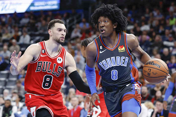 Bulls guard Zach LaVine defends Thunder guard Jalen Williams